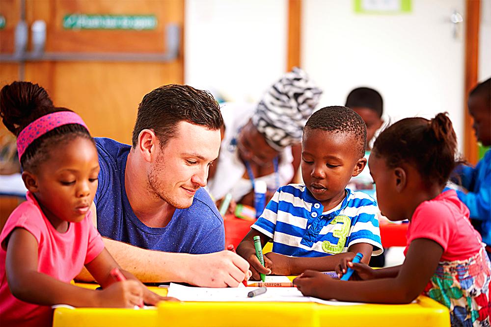 A volunteer with a child